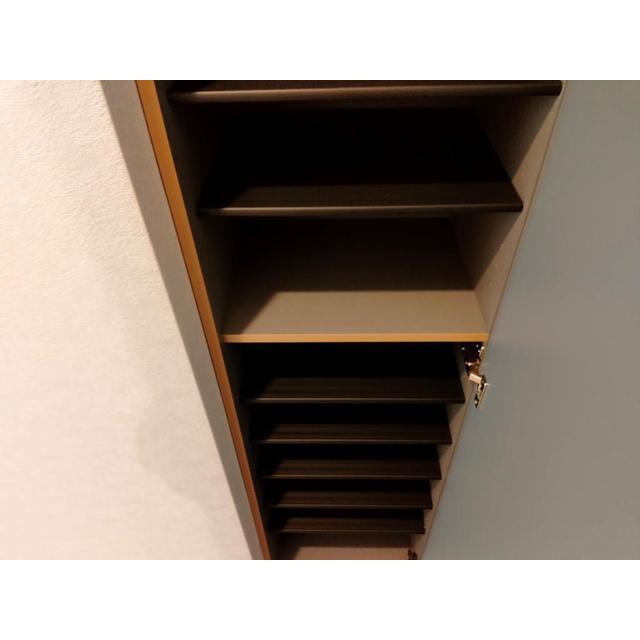 ����15