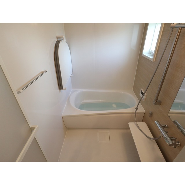 ����15