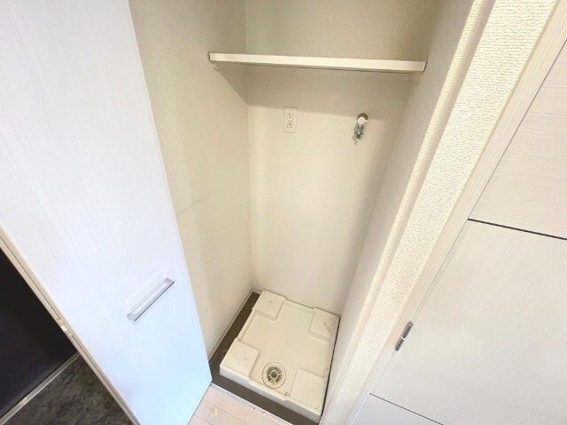 ����15
