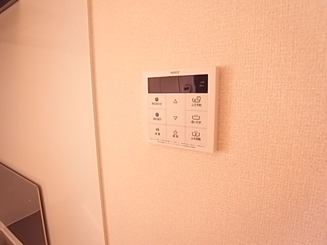 ����13