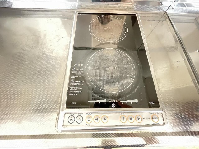 ����15