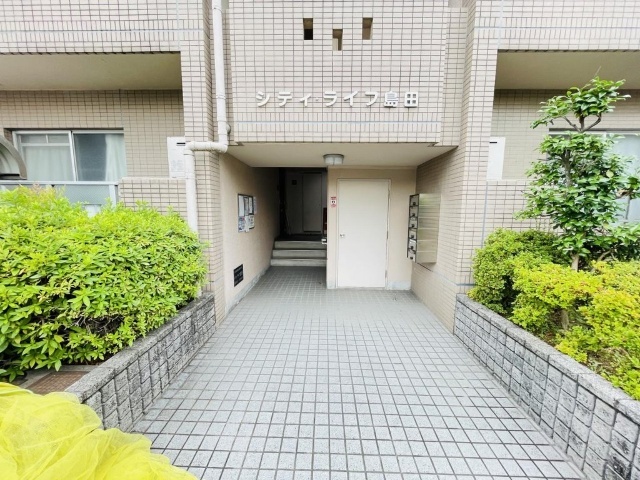 ����12