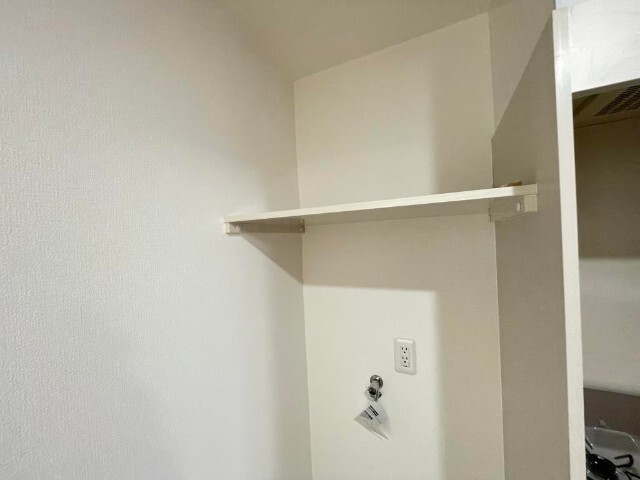 ����16