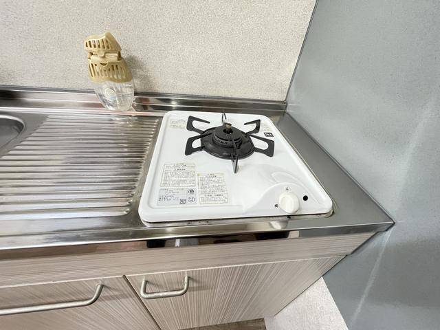 ����12