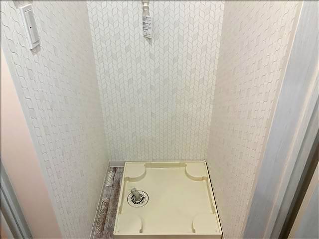 ����13