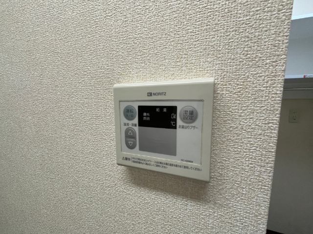 ����16