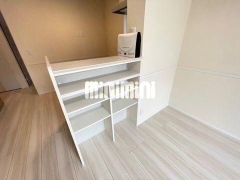 ����16