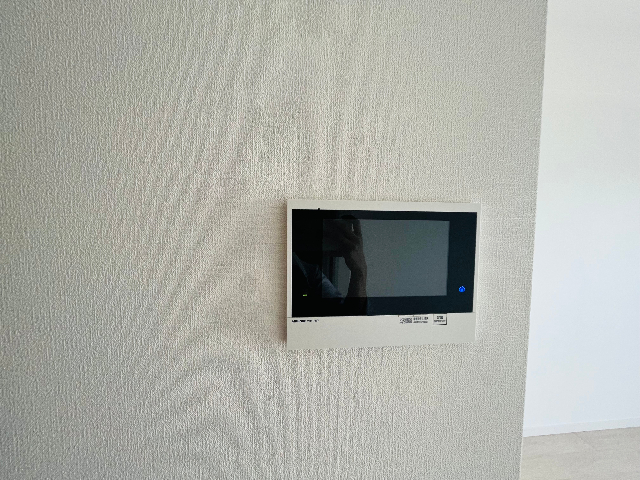 ����16