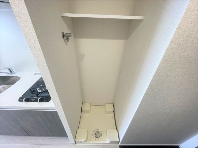 ����15