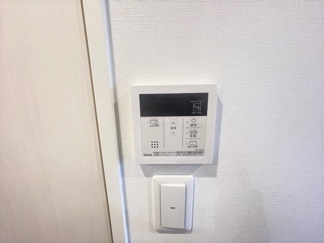 ����13