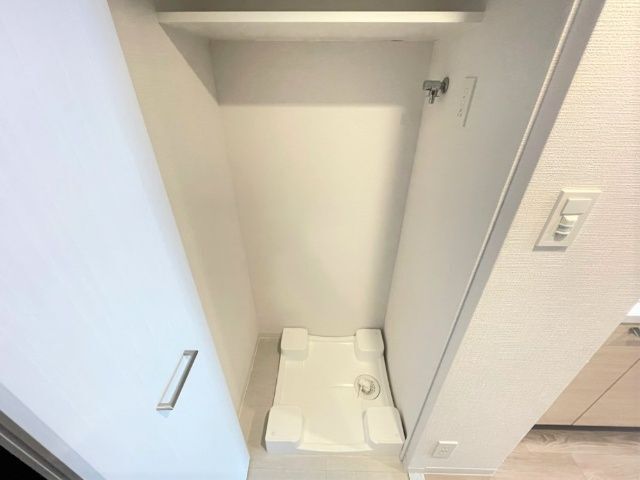 ����15