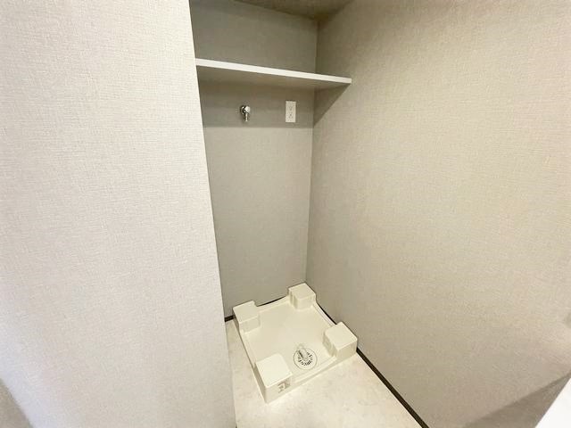 ����16