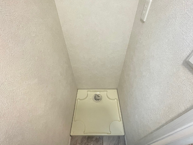 ����16