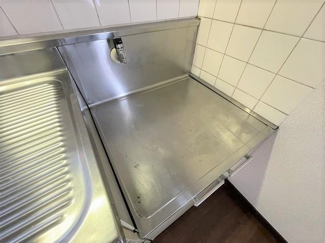 ����16