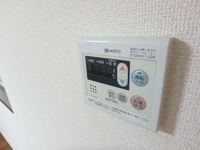 ����16