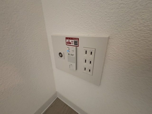 ����13