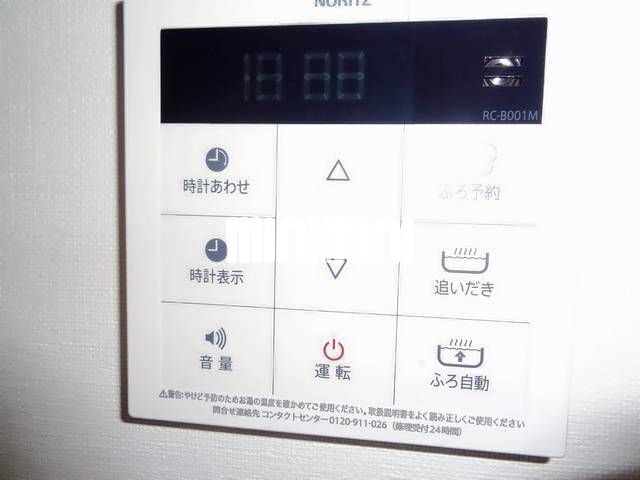 ����12