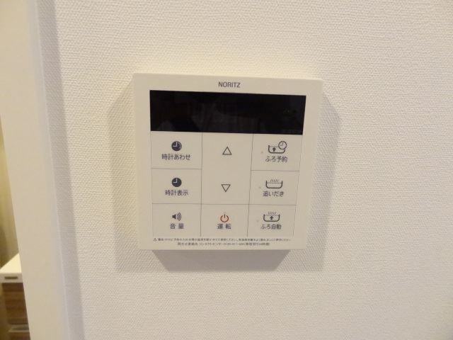 ����12