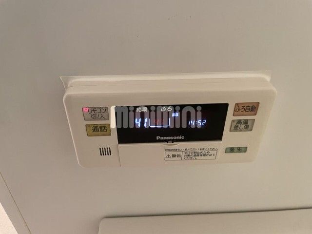 ����16