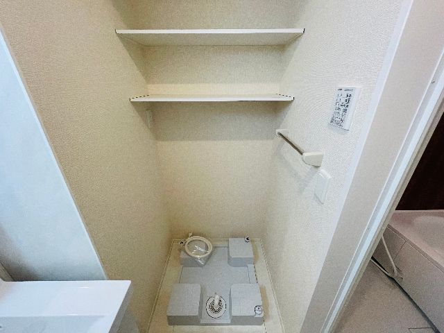����16