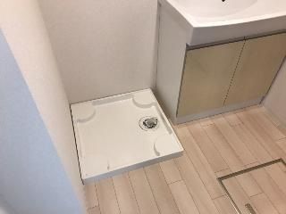 ����12