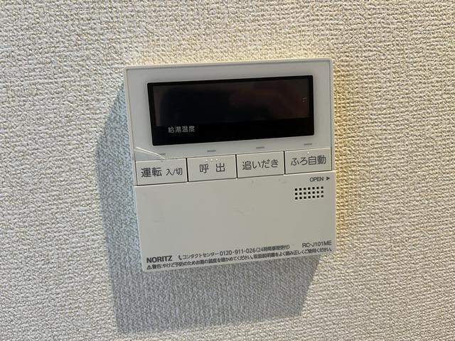 ����16