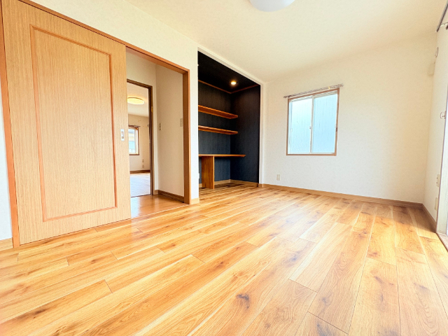 ����16