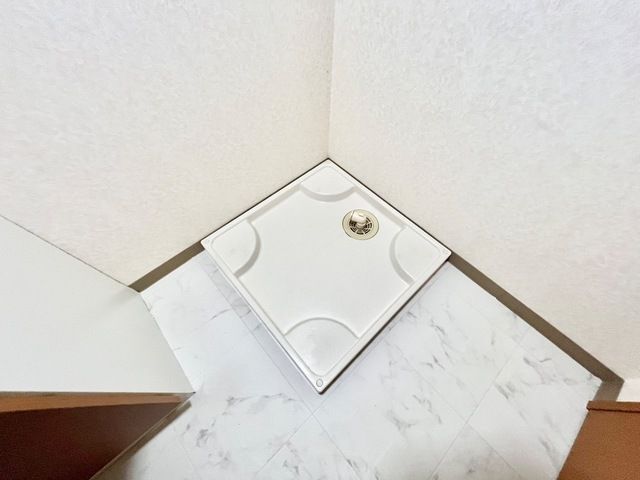 ����13
