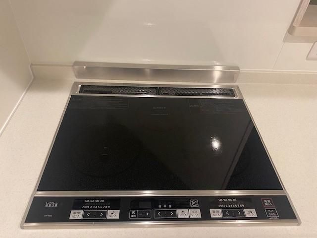 ����12