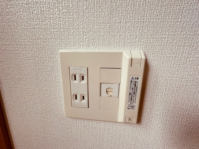 ����16