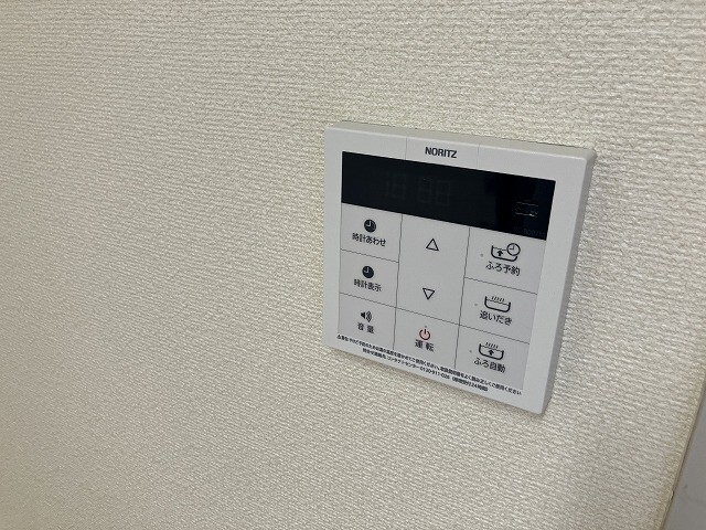 ����16