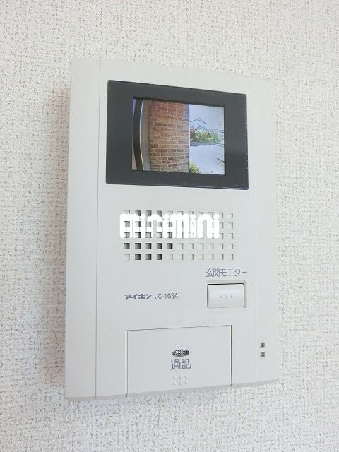 ����16