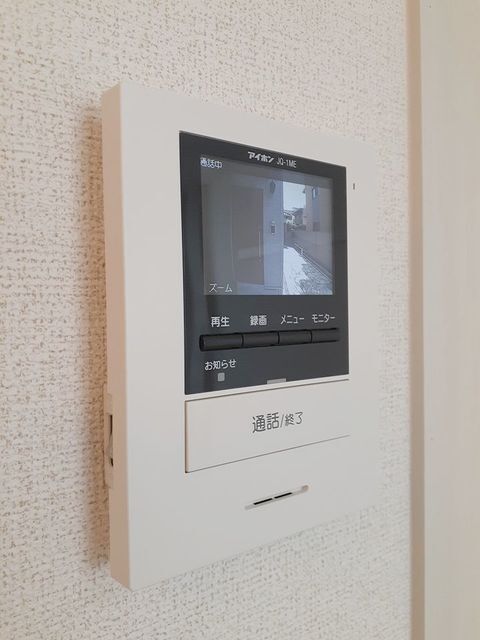 ����13