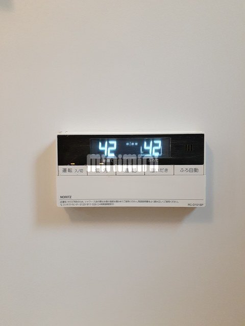 ����12