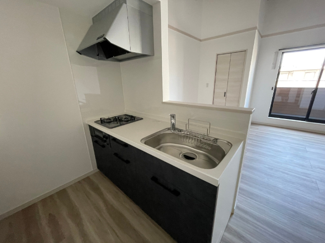 ����16