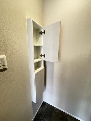 ����16