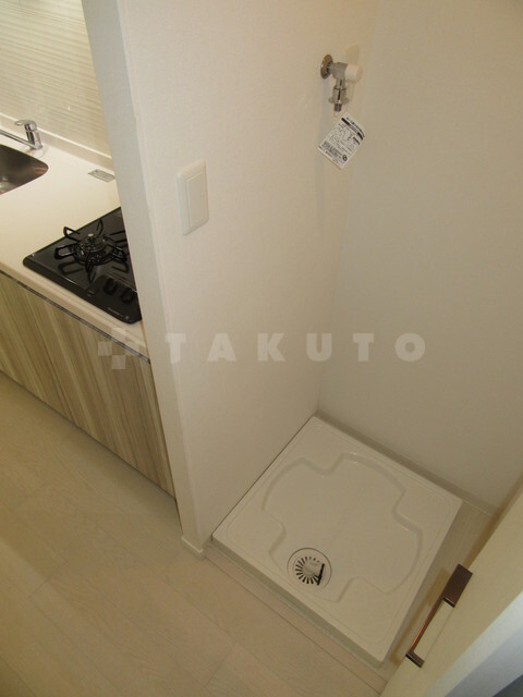 ����16
