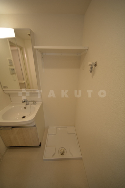 ����13