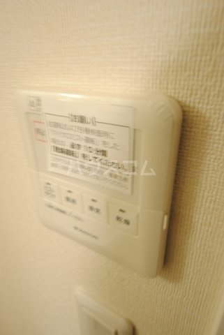 ����13