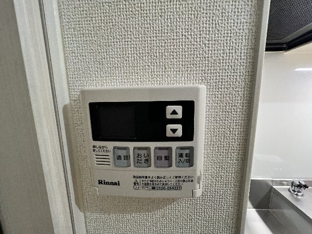 ����16