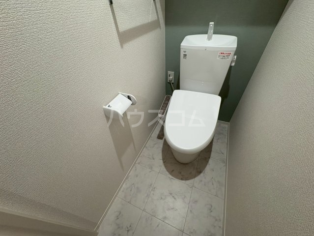 ����16