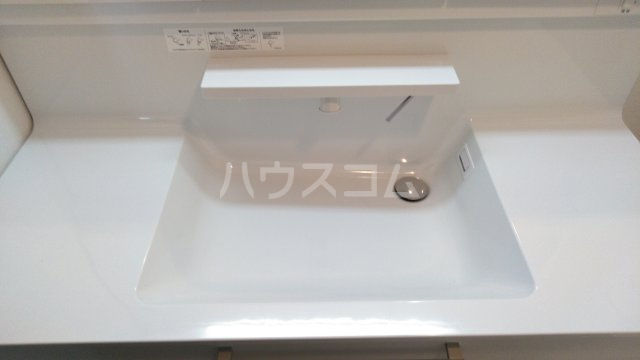 ����13