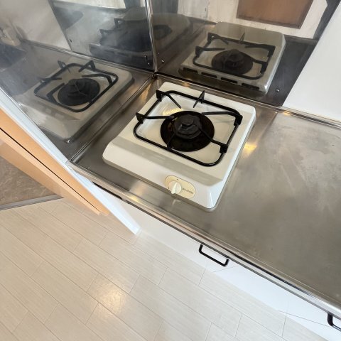 ����16