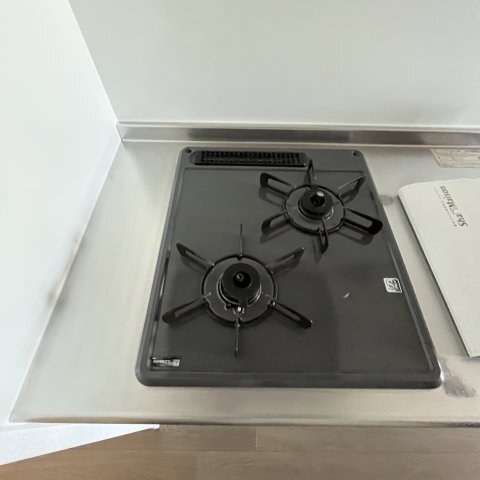 ����13
