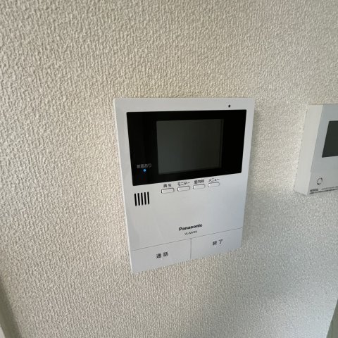����16
