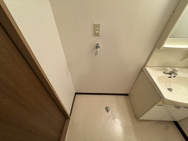 ����16