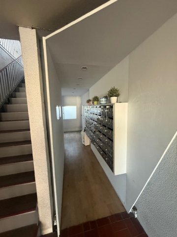 ����13